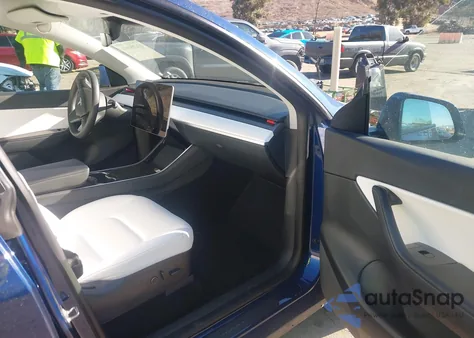 2021 Tesla Model Y Standard Range Rear-Wheel Drive from USA, damaged, VIN 5YJYGDED5MF113905